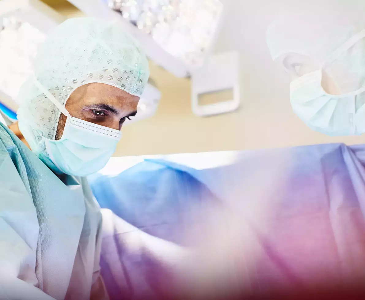 Doctors in a surgery room. 
